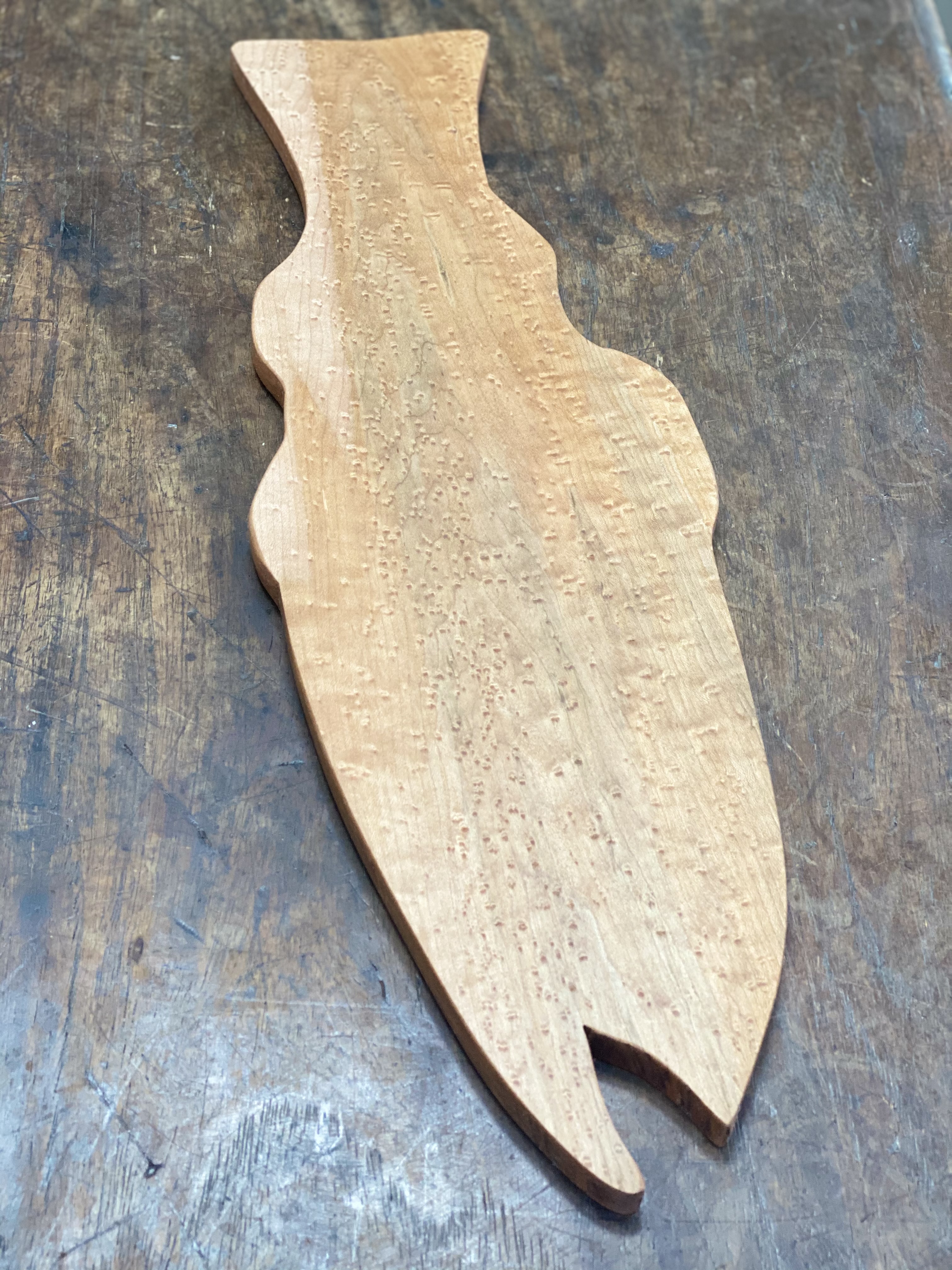 food safe maple serving board in the shape of a fish