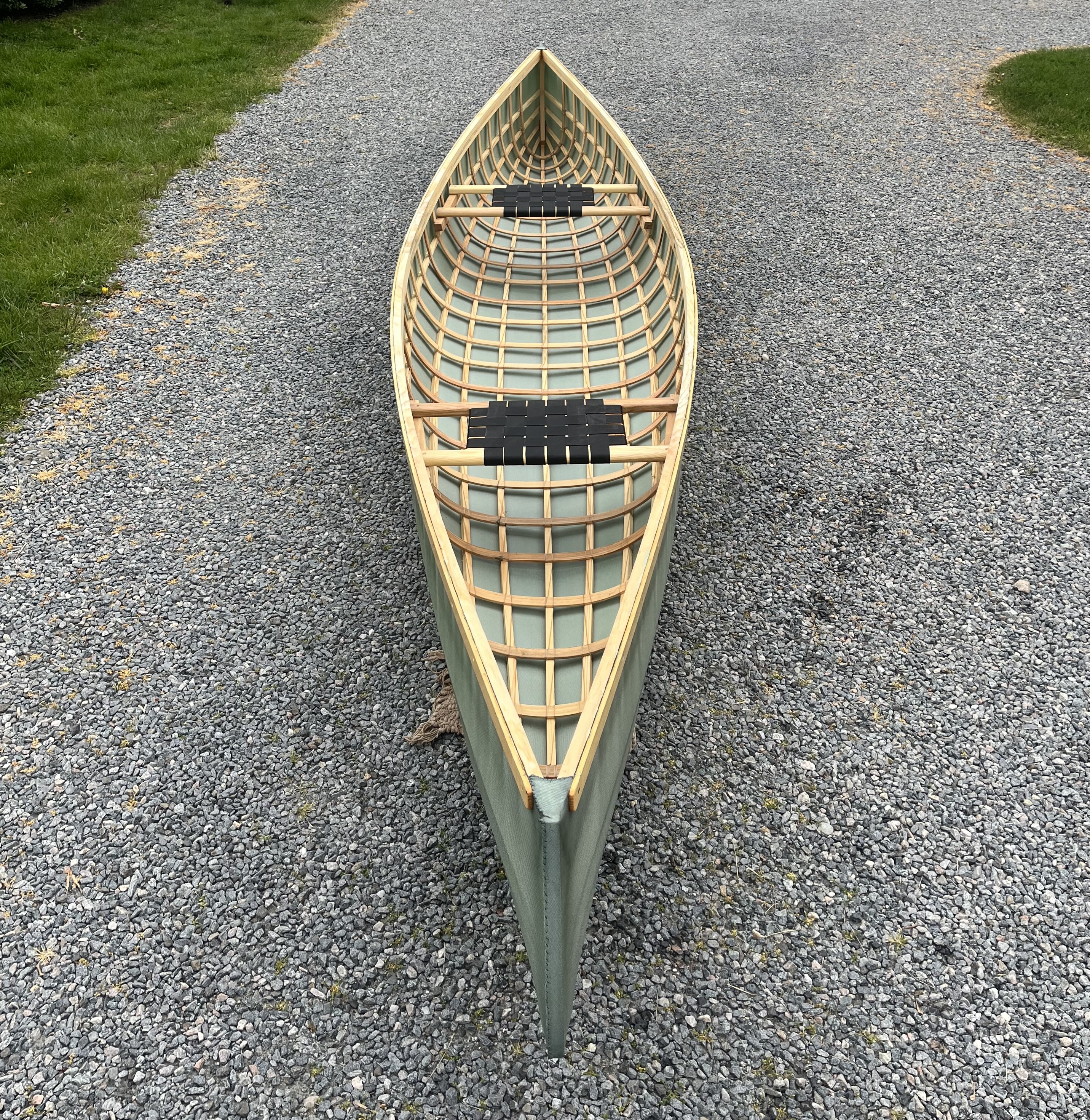 hand made, partially completed, skin on frame canoe, with seats installed